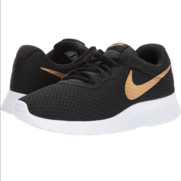 nike tanjun black gold original